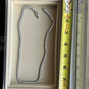 Broken cubic zirconia necklace